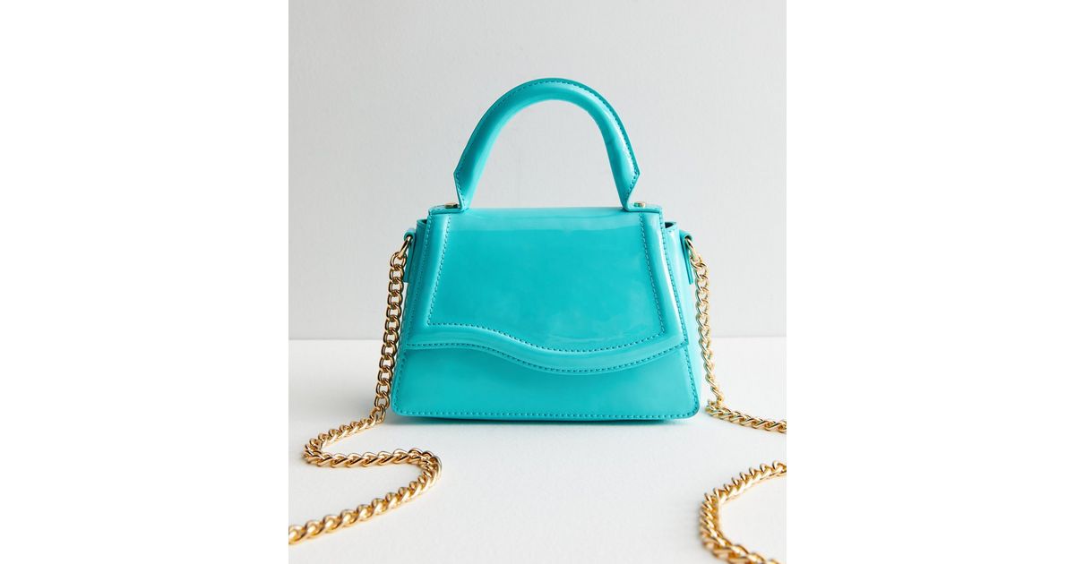 Bright Blue Patent Top Handle Cross Body Bag | New Look