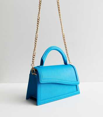 Blue Asymmetric Gold Strap Top Handle Bag