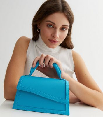 Asymmetric front cheap flap bag