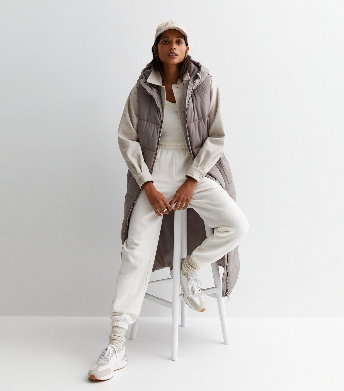 Women's Mink Long Hooded Puffer Gilet New Look