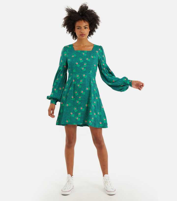 green emerald velvet dress Louche Sorrel Micro Dot Long Sleeve Midi Dress in Green main image 1