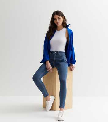 Blue Mid Rise Amie Skinny Jeans
