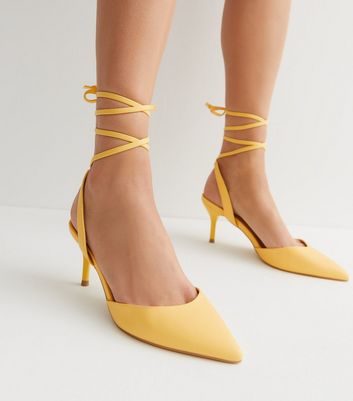 Golden store yellow pumps