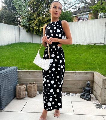 Green dress with store black polka dots