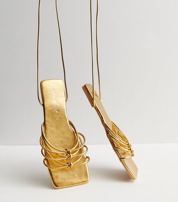 Gold strappy flat outlet sandals