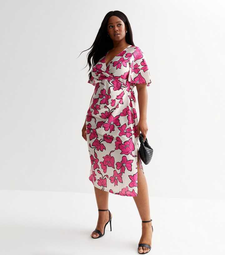 https://media2.newlookassets.com/i/newlook/862760979M2/womens/clothing/dresses/curves-pink-floral-ruched-midi-wrap-dress.jpg?strip=true&qlt=50&w=720