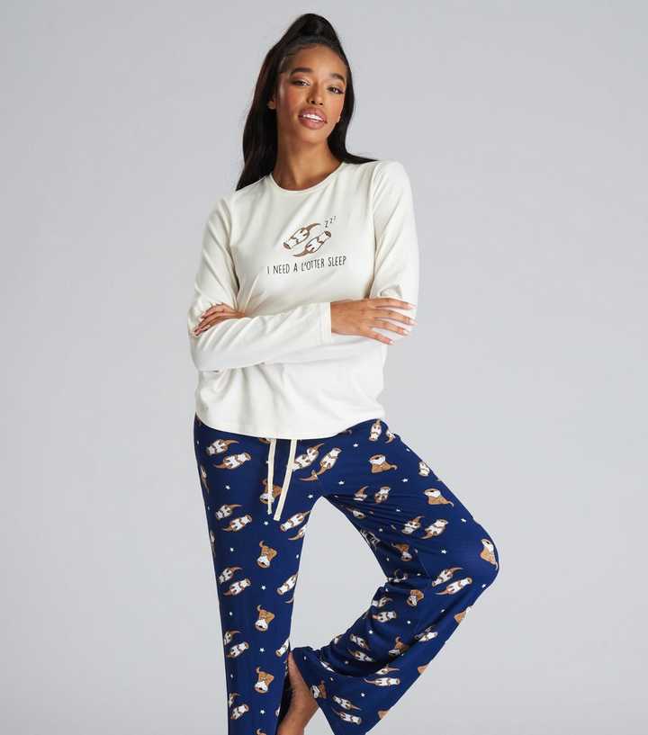 https://media2.newlookassets.com/i/newlook/863100941/womens/clothing/nightwear/loungeable-navy-long-sleeve-t-shirt-and-trouser-pyjama-set-with-otter-logo.jpg?strip=true&qlt=50&w=720