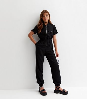 Black cuffed jumpsuit on sale