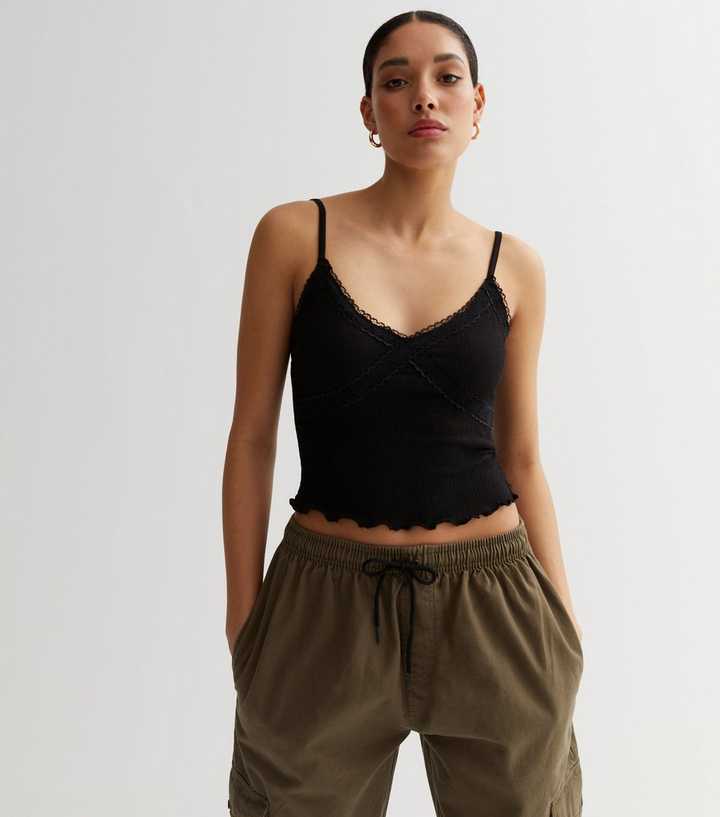 https://media2.newlookassets.com/i/newlook/864740001/womens/clothing/tops/black-crinkle-lace-trim-cami-top.jpg?strip=true&qlt=50&w=720