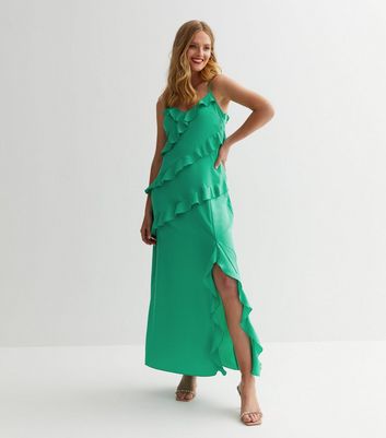 Green dress shop with ruffles