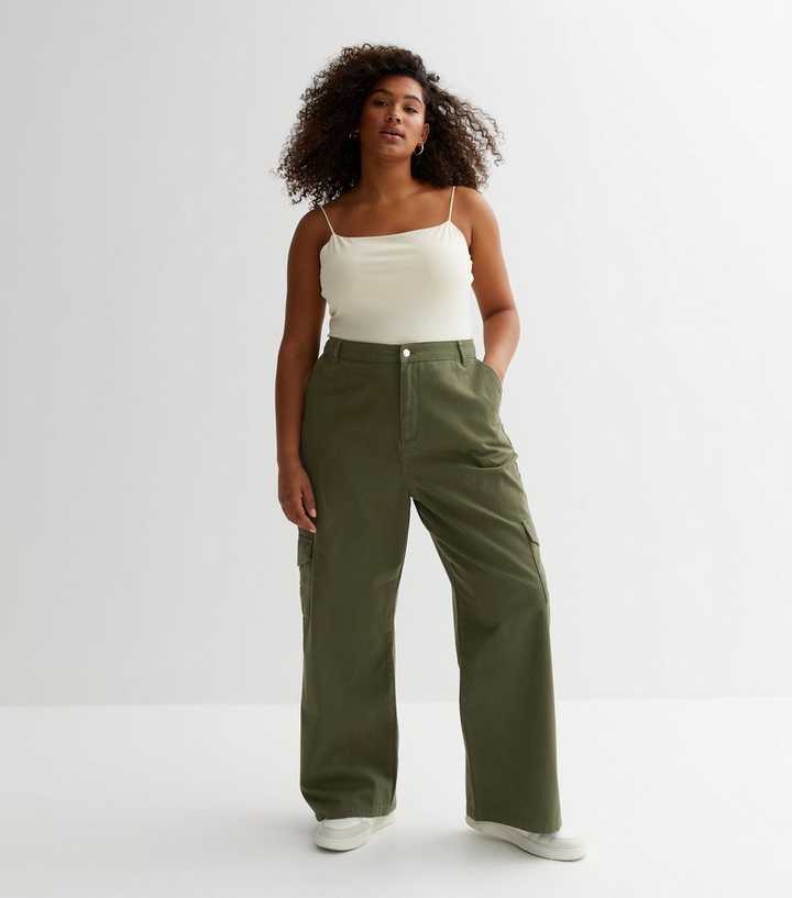 https://media2.newlookassets.com/i/newlook/865253134/womens/clothing/trousers/curves-khaki-cotton-wide-leg-cargo-trousers.jpg?strip=true&qlt=50&w=720