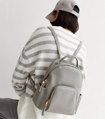 Light grey store leather backpack