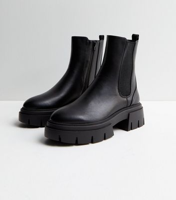 Cleated platform pull outlet on chelsea boots