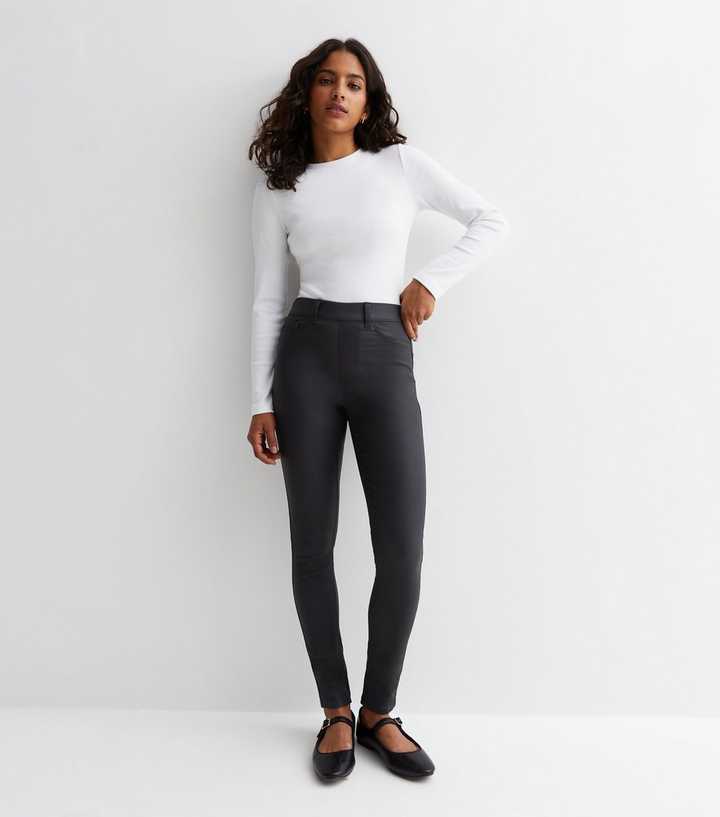 https://media2.newlookassets.com/i/newlook/867823601M1/womens/clothing/jeans/petite-black-coated-leather-look-high-waist-emilee-jeggings.jpg?strip=true&qlt=50&w=720