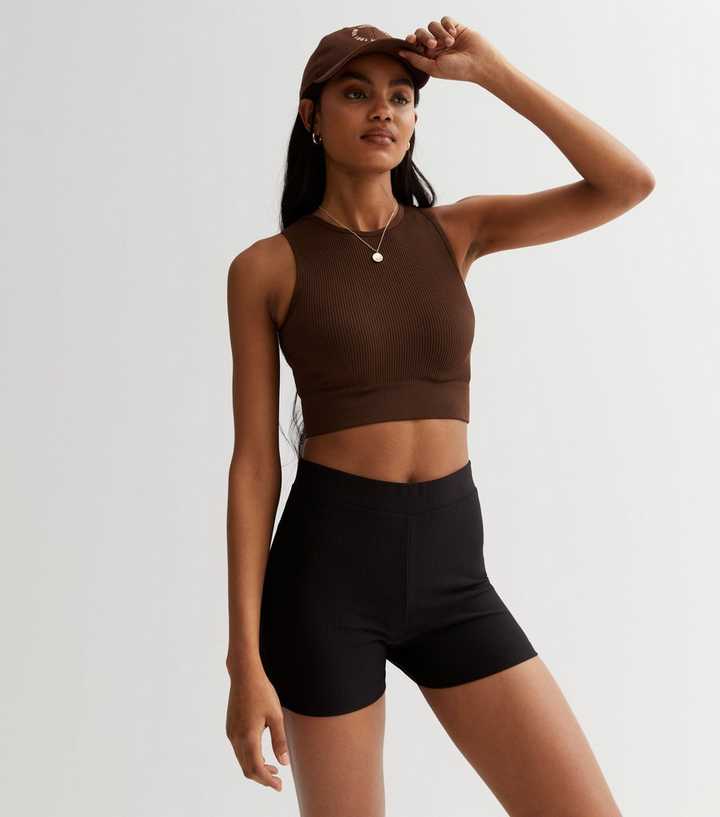https://media2.newlookassets.com/i/newlook/867920101/womens/clothing/loungewear/black-ribbed-micro-cycling-shorts.jpg?strip=true&qlt=50&w=720