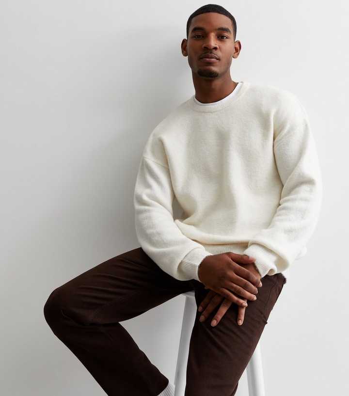 https://media2.newlookassets.com/i/newlook/868127612/mens/mens-clothing/mens-jumpers-and-cardigans/off-white-soft-knit-crew-neck-relaxed-fit-jumper.jpg?strip=true&qlt=50&w=720