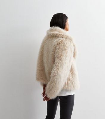 Beige coat with fur on sale collar