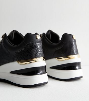 womens black gold trainers