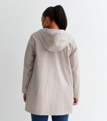 Cream store rain coat