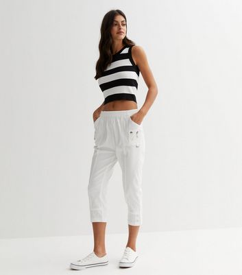 Cropped white trousers deals ladies