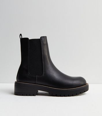 chelsea boots with gold trim