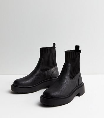 Black pull shop on sock boots