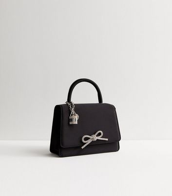 Black handbag with bow hotsell