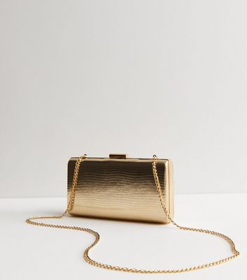 Shiny gold hotsell clutch bag