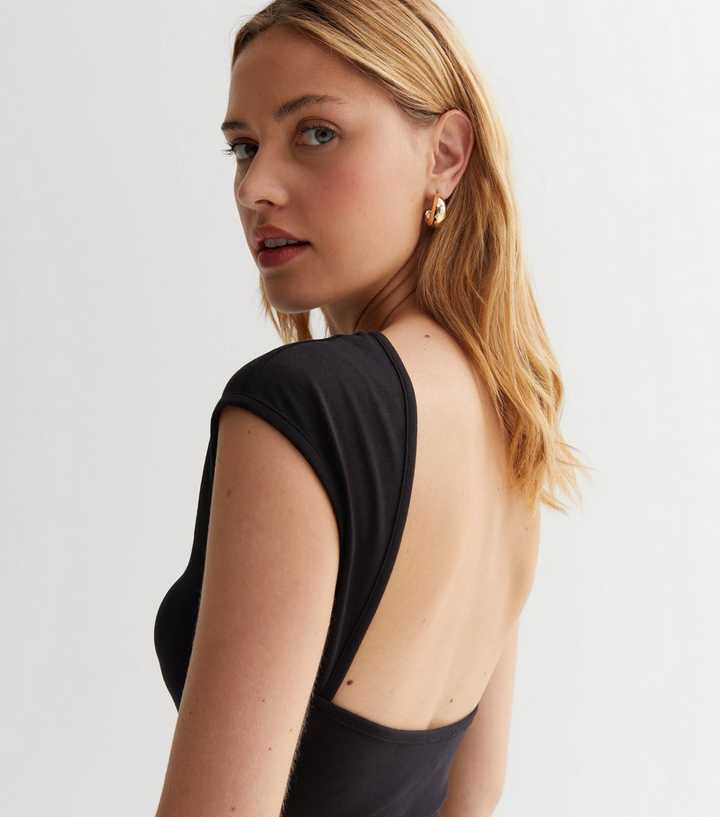 https://media2.newlookassets.com/i/newlook/872412301M2/womens/clothing/tops/black-cotton-blend-backless-bodysuit.jpg?strip=true&qlt=50&w=720