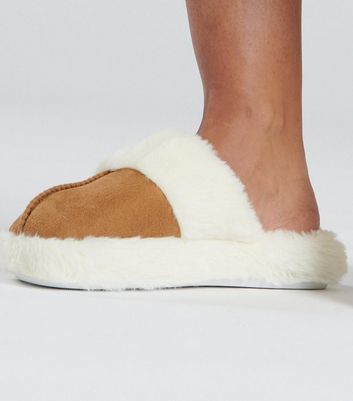 Tan slippers with online fur