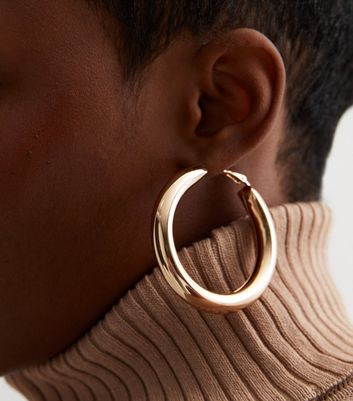 Gold single shop hoop earring