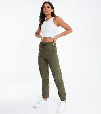 Buy Gina Tricot Wilma satin cargo trousers - Black | Nelly.com