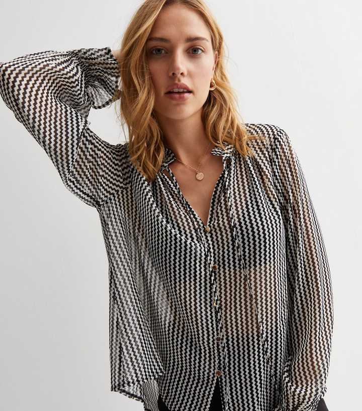 Semi-sheer blouse with tie detail · Black · Shirts