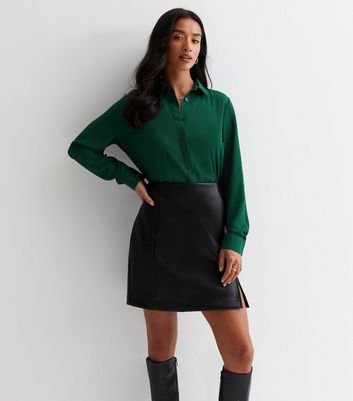 Black shirt and outlet green skirt