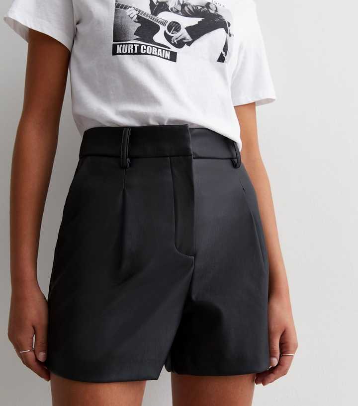 Go all-black with a bodysuit, high-waisted tailored shorts, and a, How to  Wear Shorts For Fall, Because Yes You Can