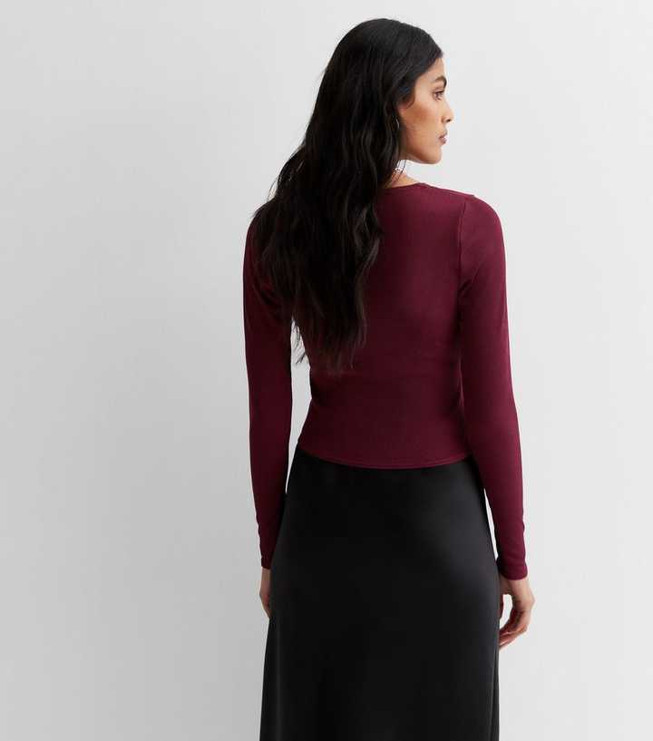 maroon long sleeve top