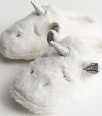 White store unicorn slippers