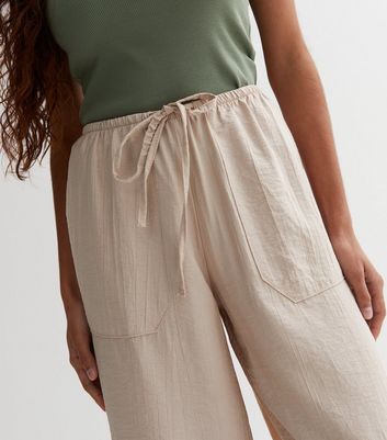 Plain Crinkle Effect Shirred Waist Wide Leg Trousers (6 Colours) – Missy  Online: Shoes, Fashion & Accessories Based in Leeds