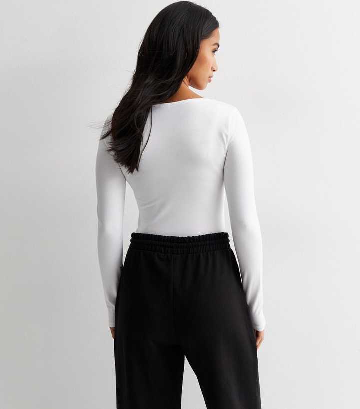 white v neck bodysuit long sleeve