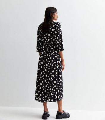 New look black shop and white spotty dress