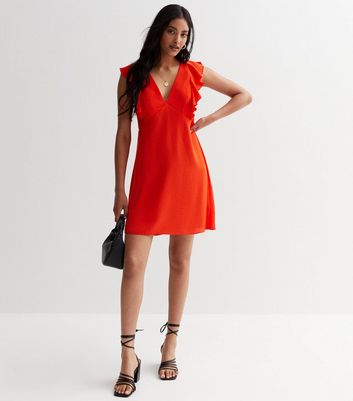 Sleeveless red wrap store dress