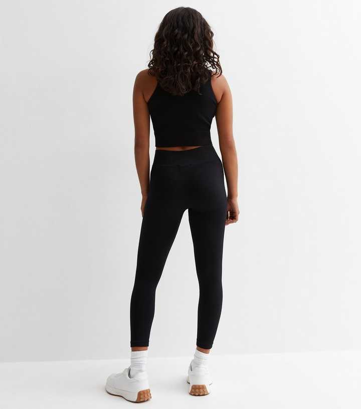 https://media2.newlookassets.com/i/newlook/875666801M3/womens/clothing/leggings/petite-black-ribbed-jersey-seamless-leggings.jpg?strip=true&qlt=50&w=720