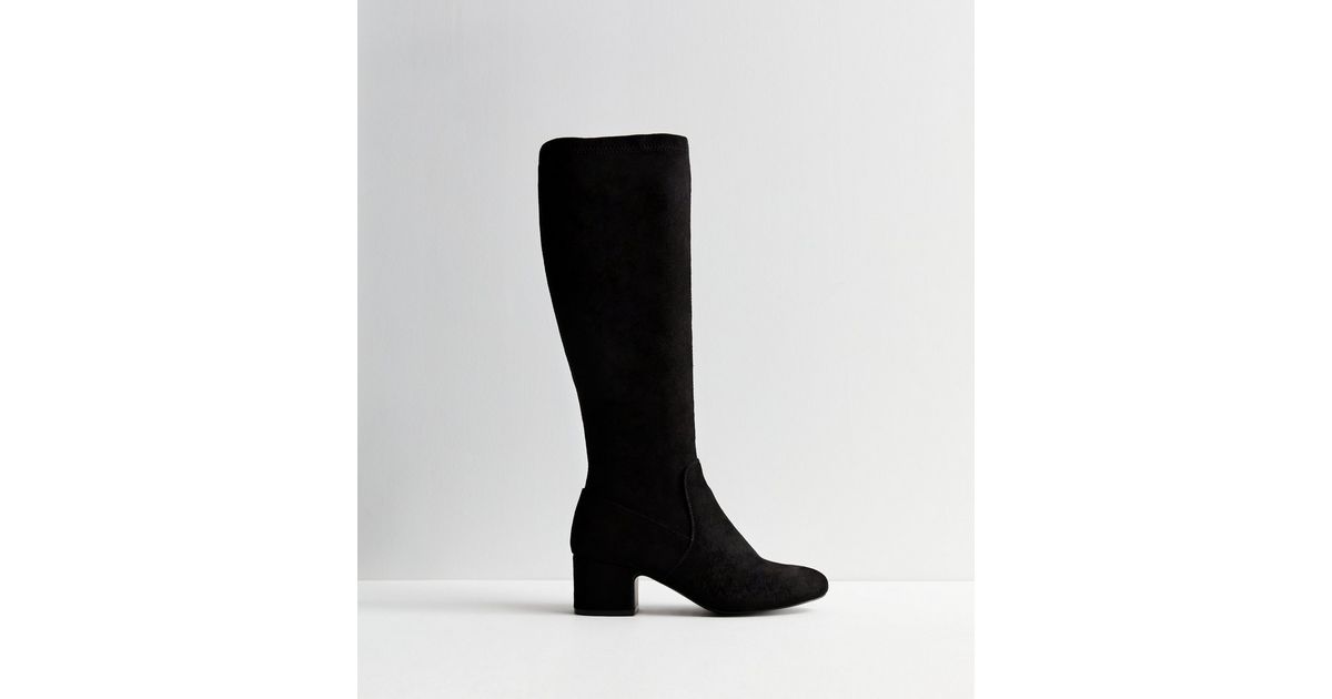 block heel stretch knee high boots