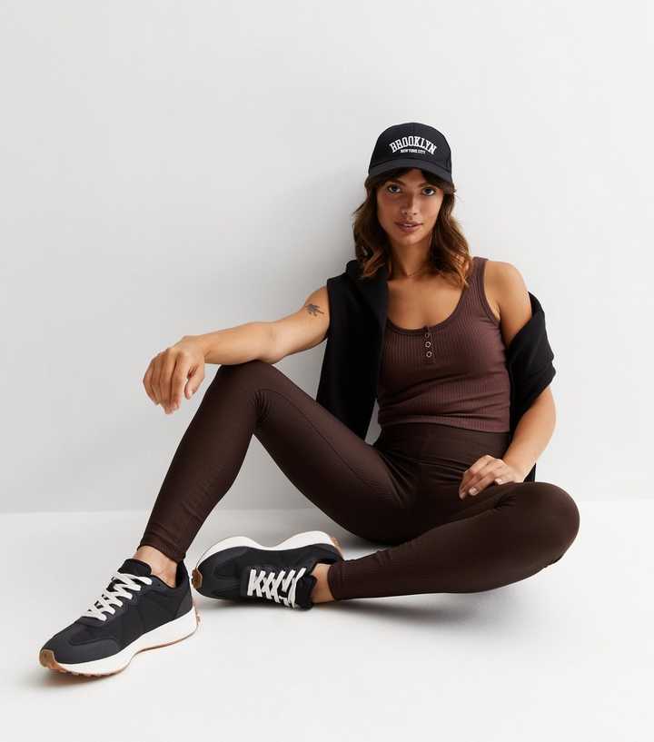 https://media2.newlookassets.com/i/newlook/876302727/womens/clothing/leggings/dark-brown-ribbed-jersey-leggings.jpg?strip=true&qlt=50&w=720