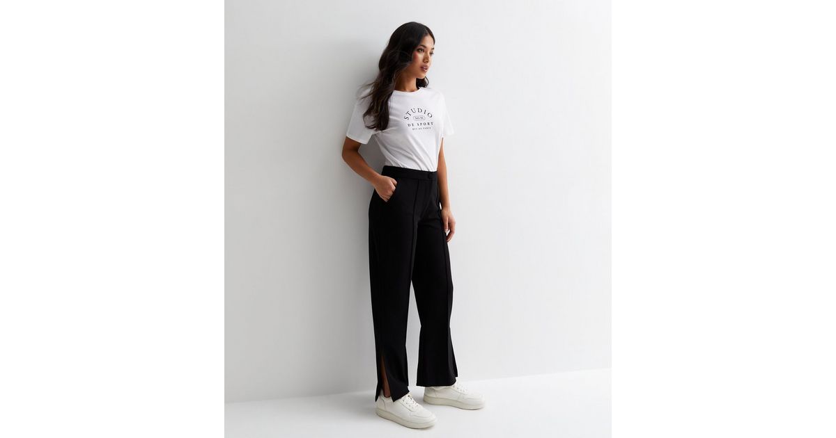 JDY Petite high waist flared pants in black