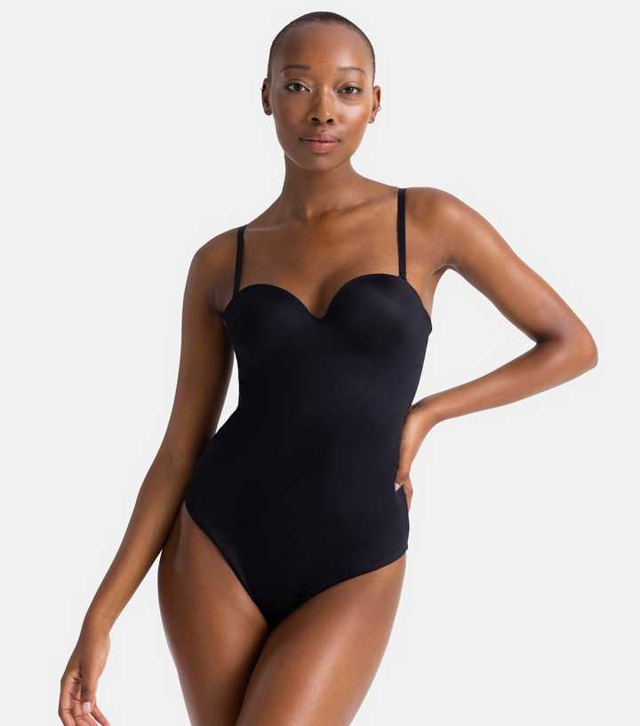 https://media2.newlookassets.com/i/newlook/876556801/womens/clothing/lingerie/dorina-black-strappy-shaping-bodysuit.jpg?strip=true&qlt=50&w=720