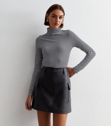 Turtleneck and mini on sale skirt