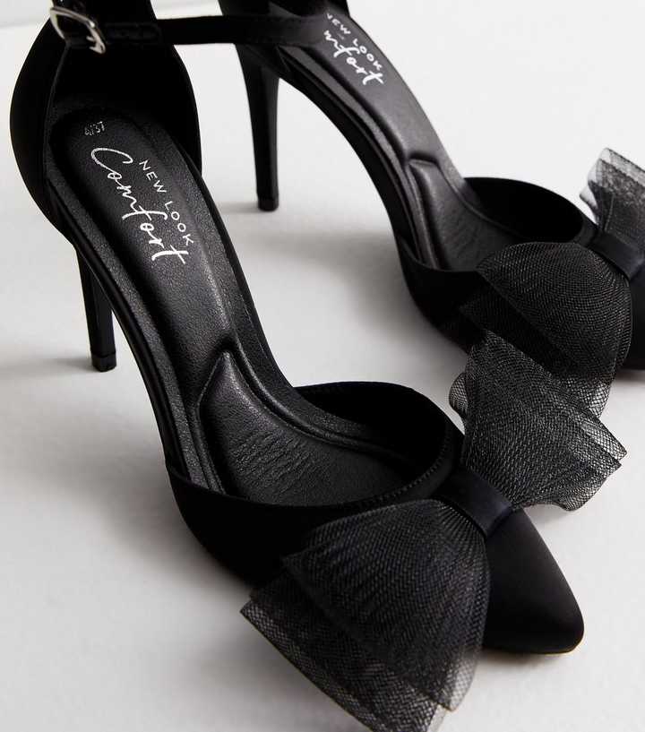 black heels with bow on front