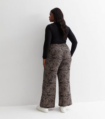Marc O'Polo Wide leg trousers made of jersey in black/ beige