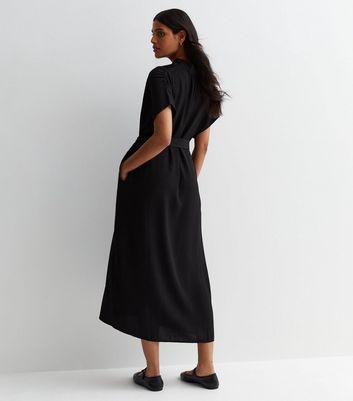 Black batwing belted sales dress